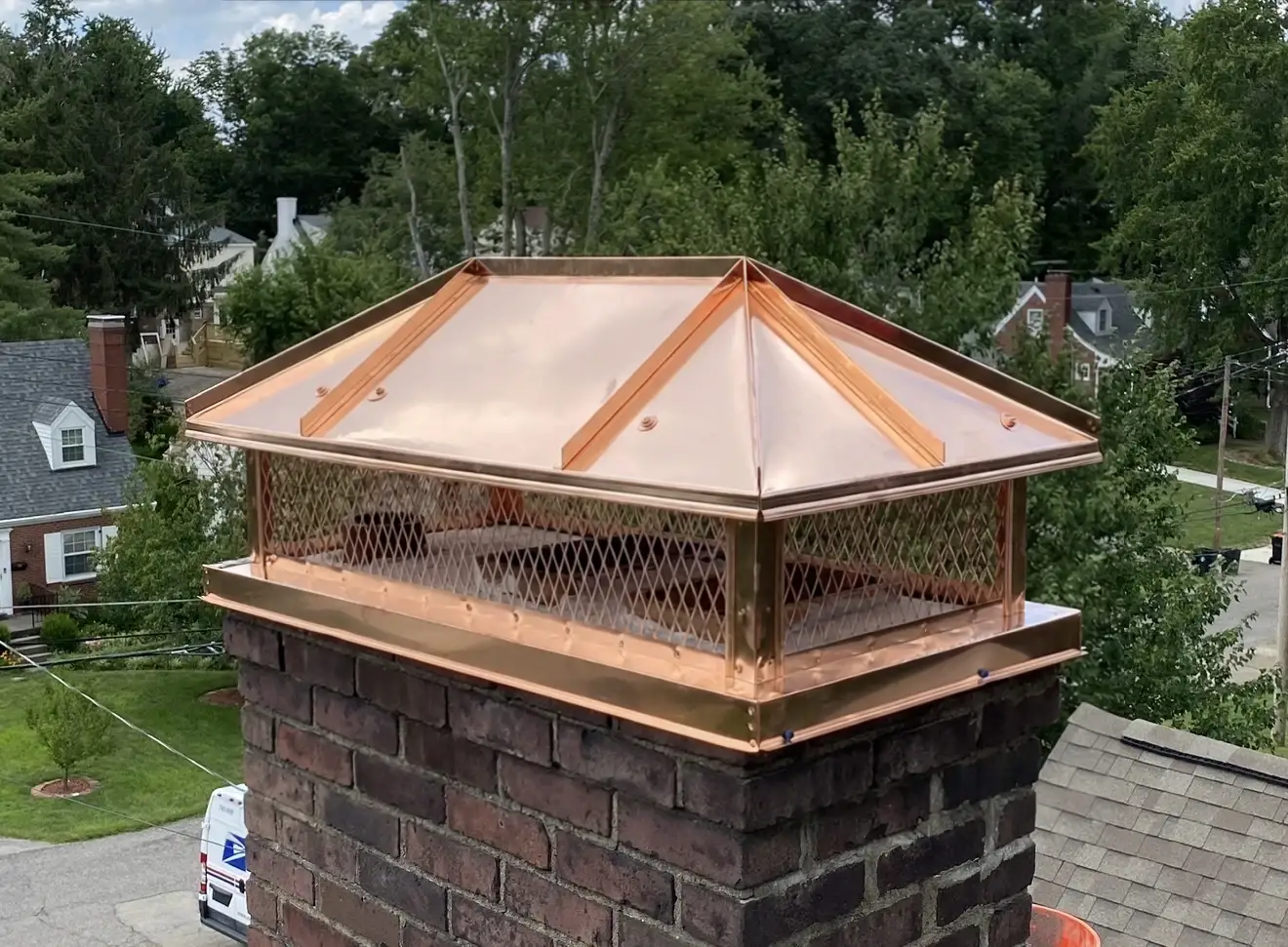 Custom copper chimney cap installed by Chimney Experts