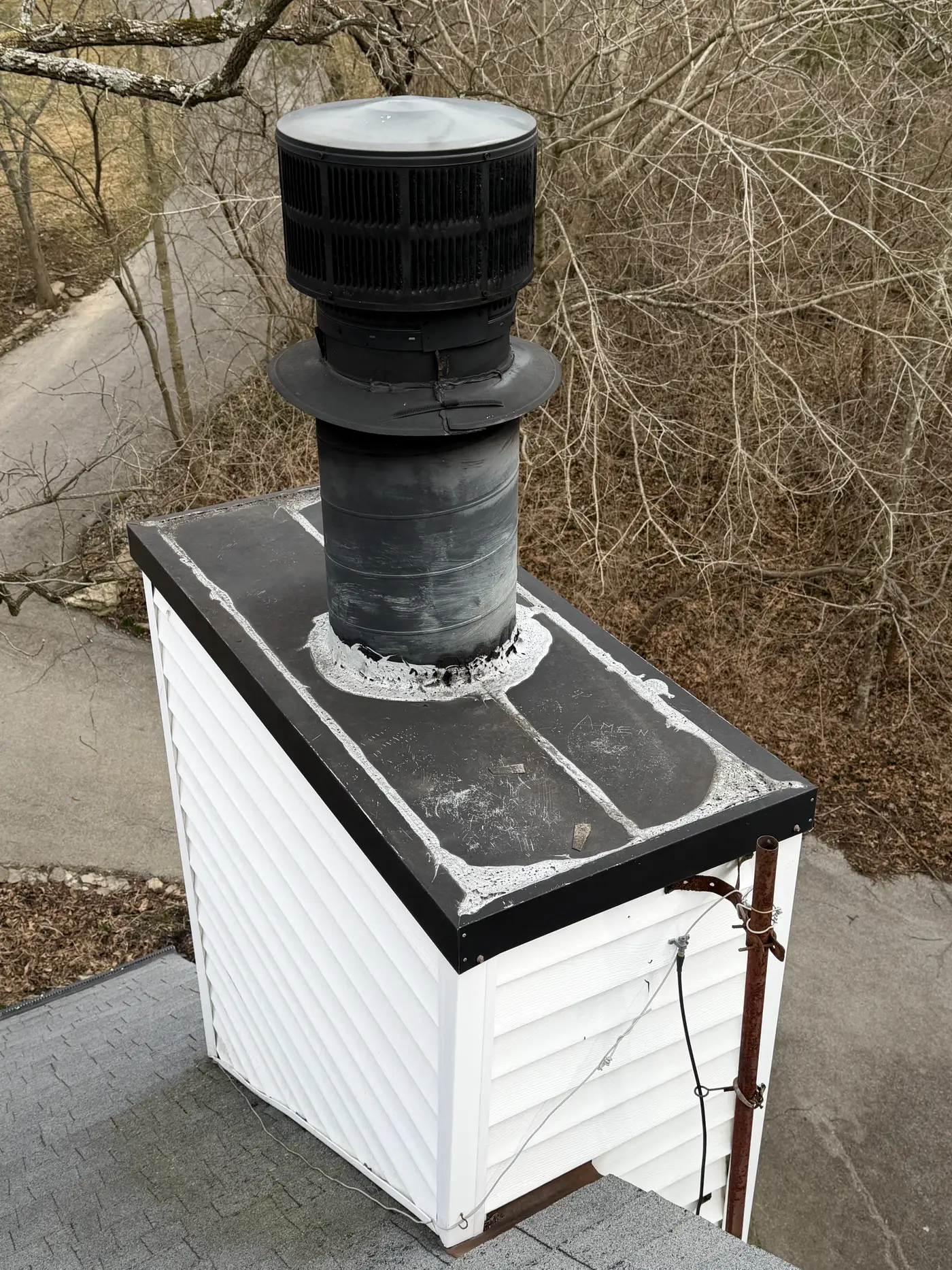 Aging chimney chase top and cap before the chimney fire discovery — Crestwood, KY