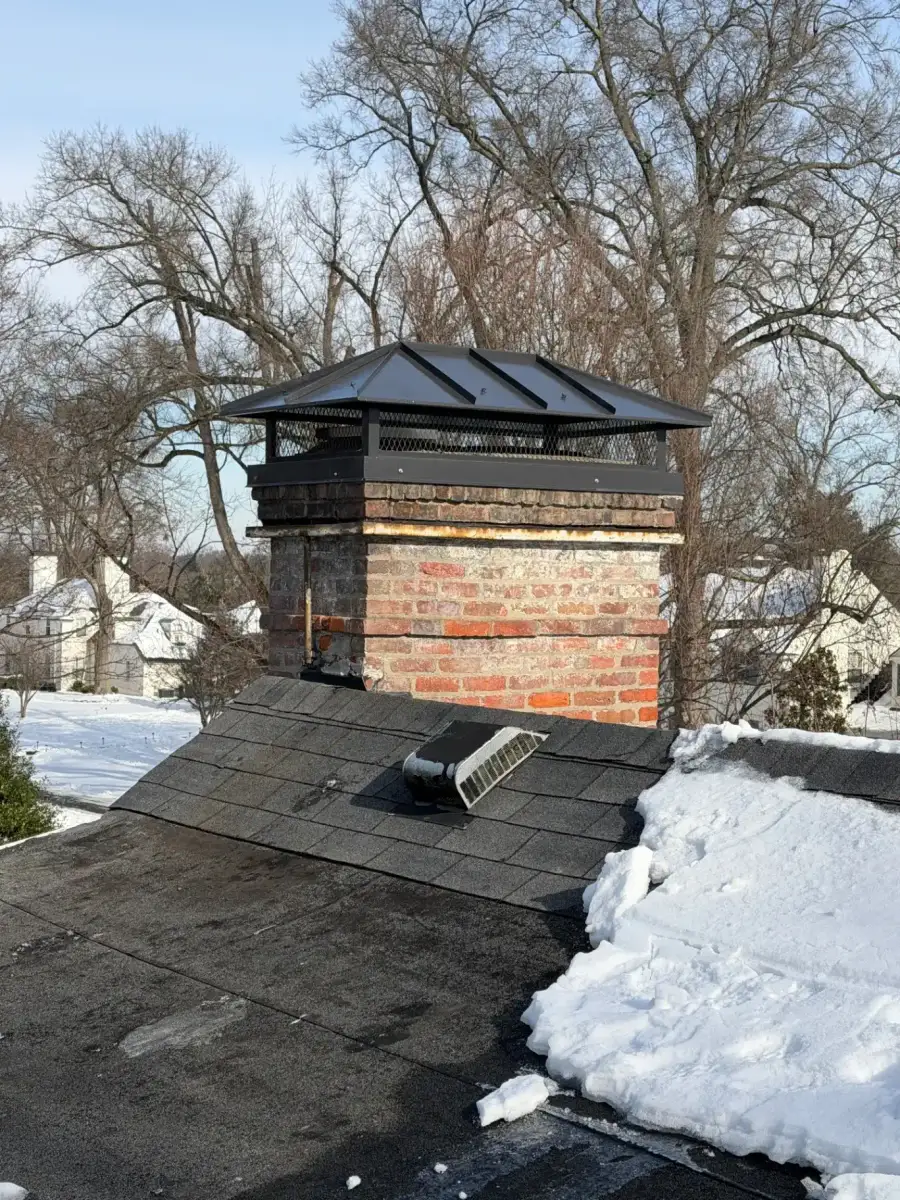 Custom stainless steel chimney cap painted to match shutters — Mockingbird Valley, Louisville, KY