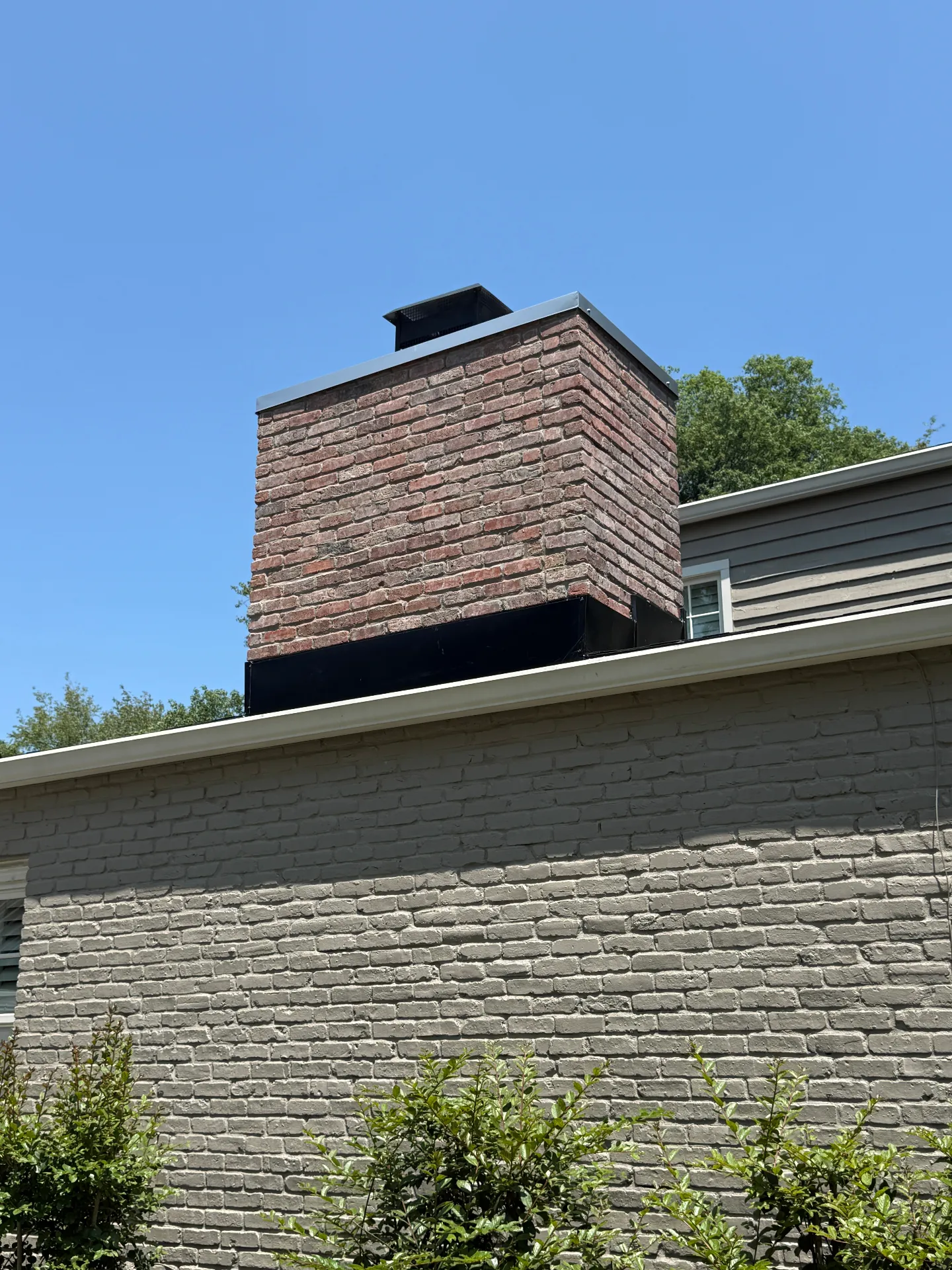 Completed chimney rebuild with new chase cover — Prospect, KY
