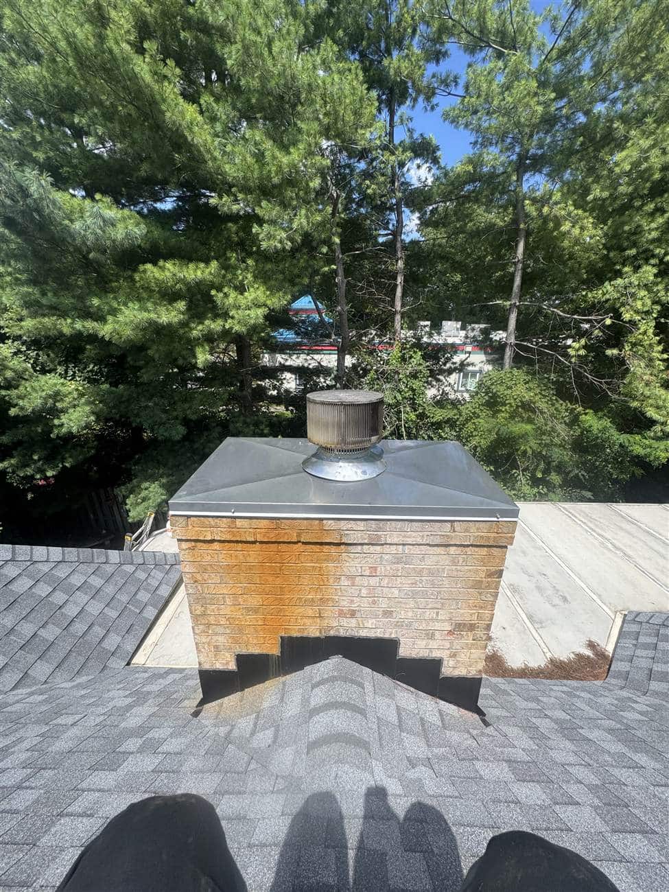 New custom stainless steel chase cover installed with the chimney cap reinstalled — Louisville, KY