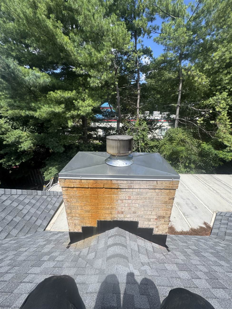 New custom stainless steel chase cover installed with the chimney cap reinstalled — Louisville, KY